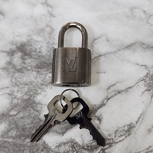 Authentic Louis Vuitton Silver Lock and Key